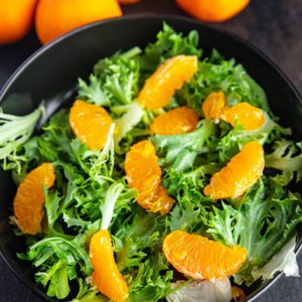vecteezy_salad-citrus-lettuce-mix-leaves-tangerine-or-orange-meal_4372421