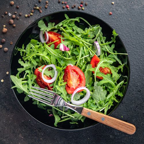 vecteezy_salad-fresh-vegetable-arugula-tomato-onion-plate-meal_3824808_762